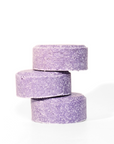 Three stacked bars of rounded lavender chamomile shampoo bars