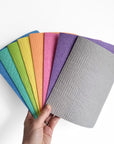 A colourful fan of cellulose cloths (reusable paper towels)