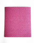 A pink cellulose cloth (reusable paper towel)