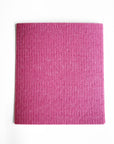 A pink cellulose cloth (reusable paper towel)