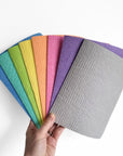 A colourful fan of cellulose cloths (reusable paper towels)