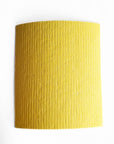 A yellow cellulose cloth (reusable paper towel)