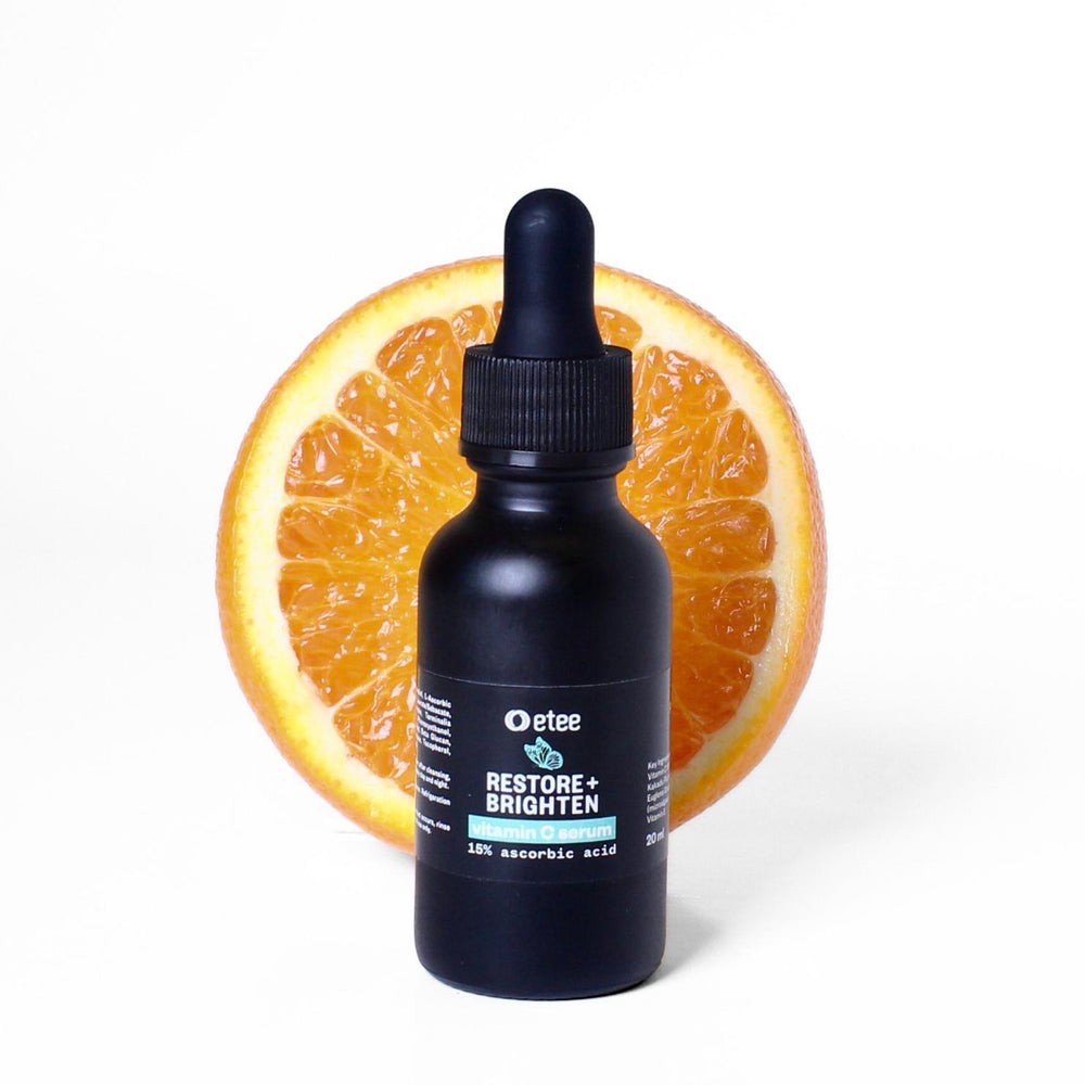 Vitamin C serum 15% ascorbic acid in dark bottle with dropper