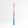 Bamboo toothbrush with teal handle