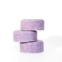 Three stacked bars of rounded lavender chamomile shampoo bars