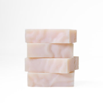 Four etee dish soap bars stacked on top of each other