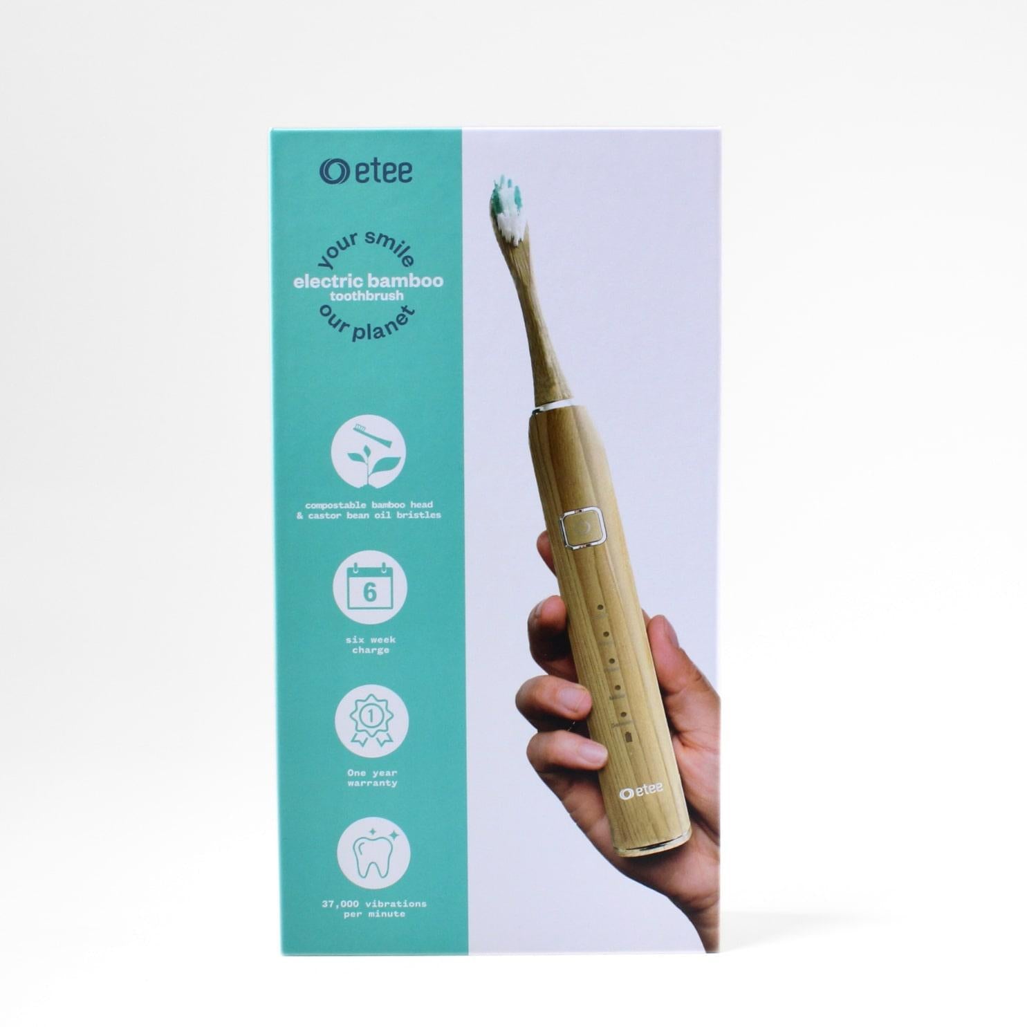 etee electric toothbrush with replaceable bamboo head box with image of hand holding up the toothbrush