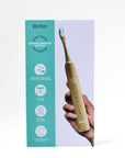 etee electric toothbrush with replaceable bamboo head box with image of hand holding up the toothbrush