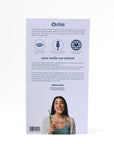 etee electric toothbrush with replaceable bamboo head - back of box showing woman holding up toothbrush and smiling