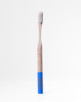 Bamboo toothbrush with blue handle