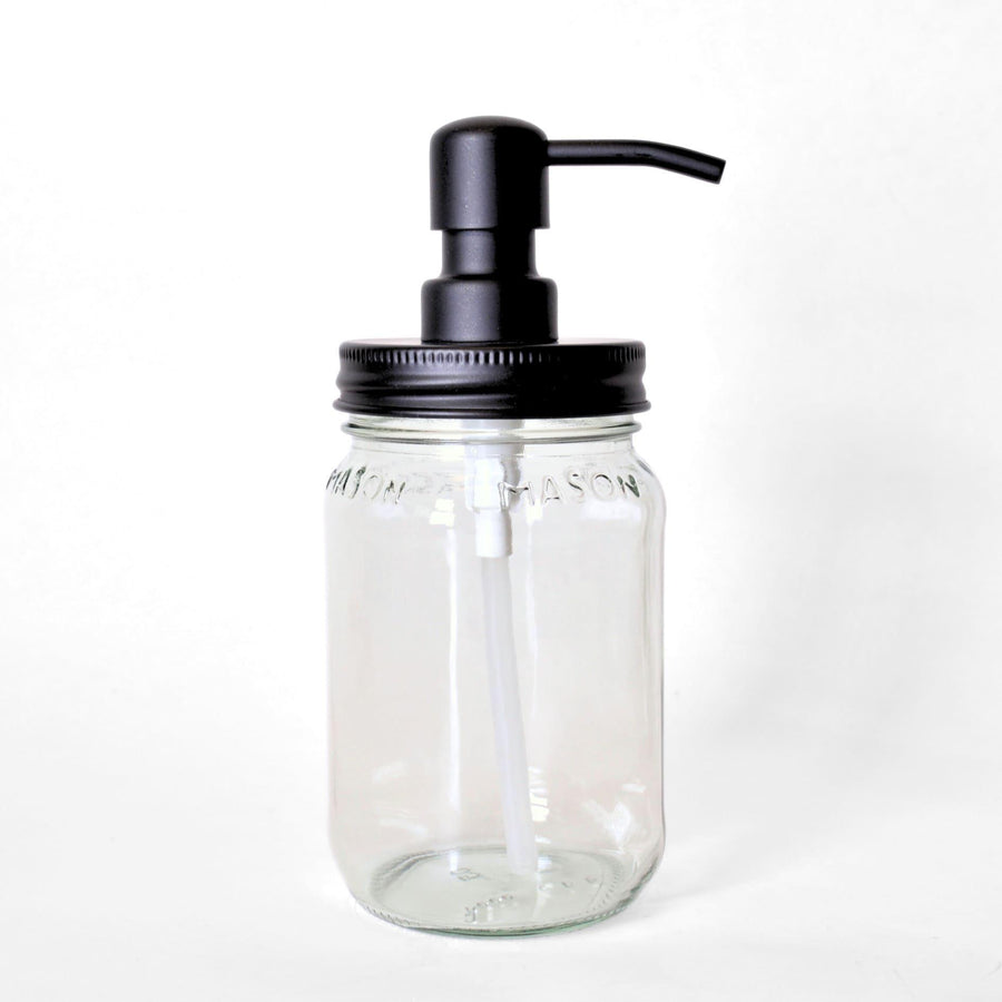 Glass soap dispenser in etee mason jar on white background